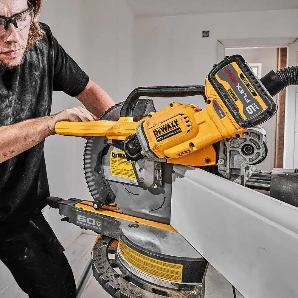 Tall fence allows for cutting trim upright.