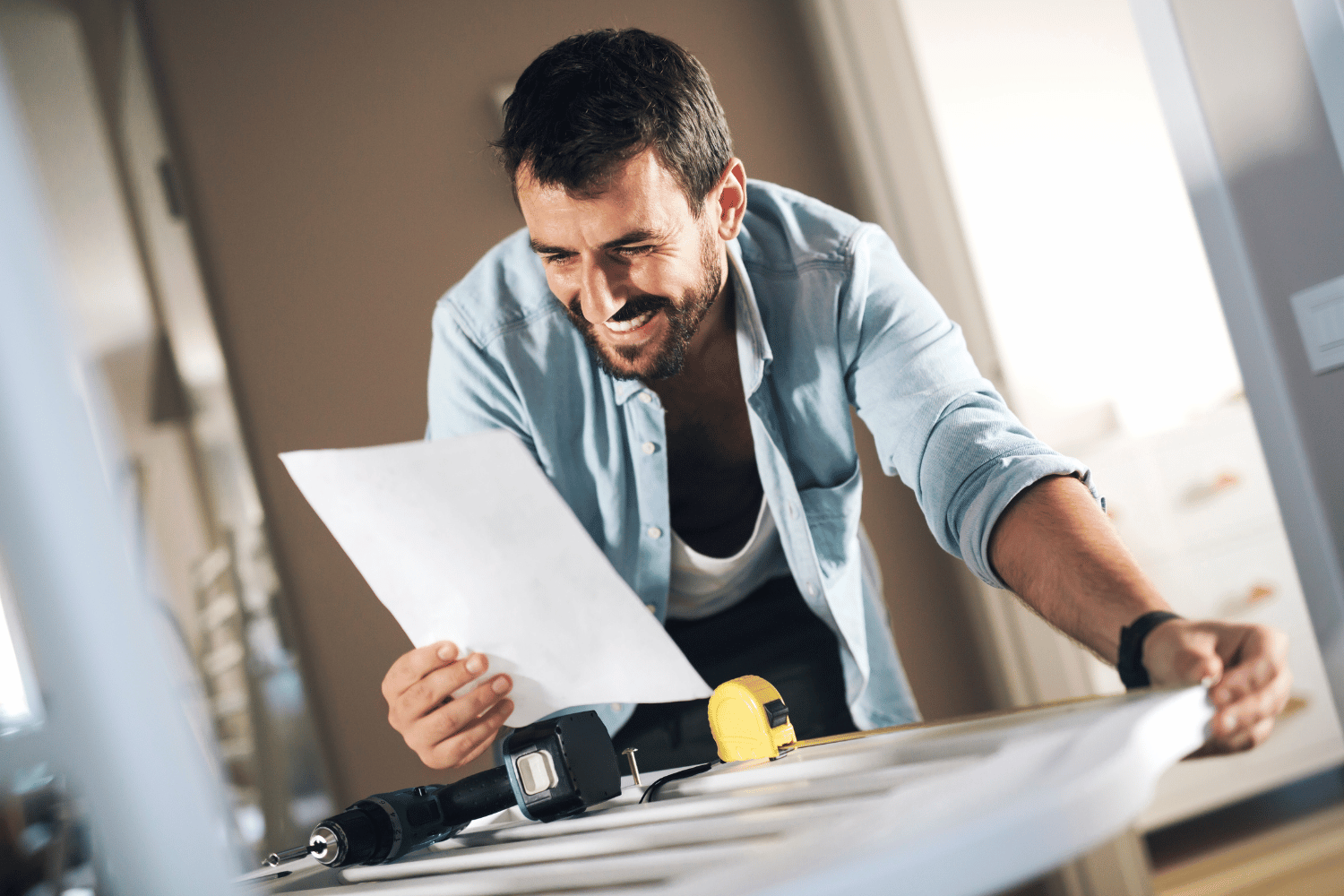A person reading the manufacturer's safety guidelines and instructions