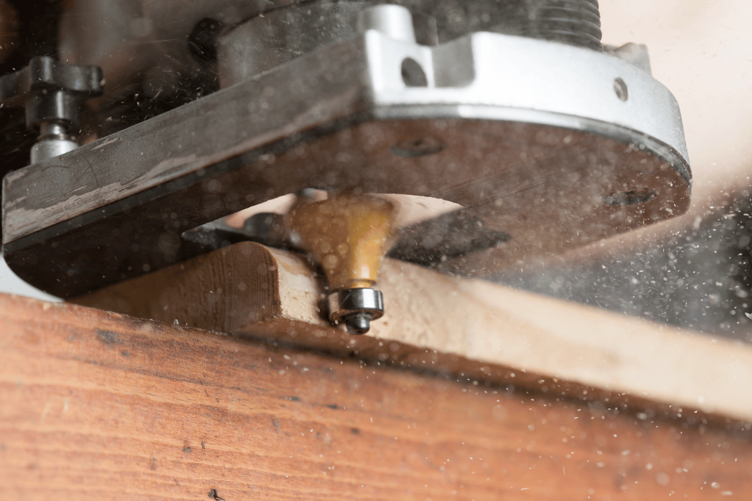 Pass the router along the outside edge to create a curved edge in your workpiece.