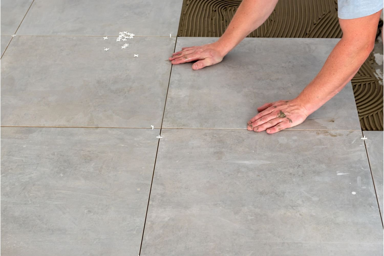Lay out your tile pattern before cutting so you know what will need to be cut.